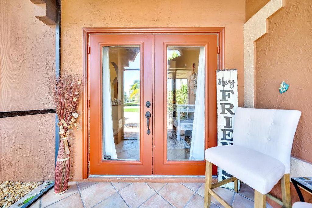 Photo of 1180 SW Mirror Lake Cv, Port Saint Lucie, FL 34953 (MLS # R10975191)