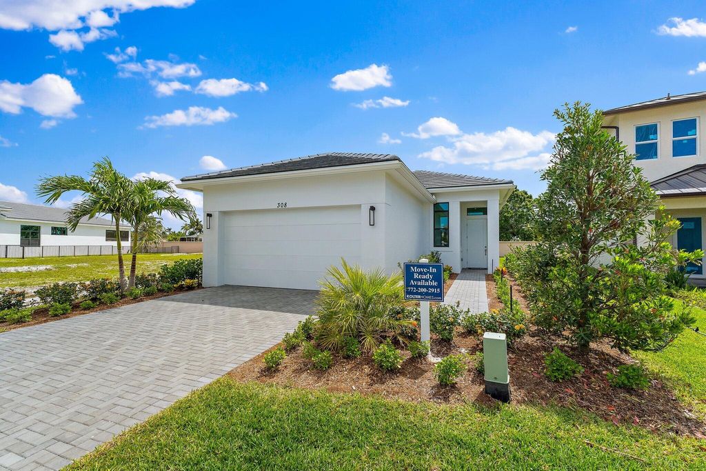 Photo of 308 SE Via Sangro, Port Saint Lucie, FL 34952 (MLS # B26003267)