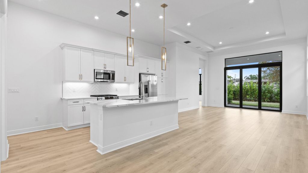 Photo of 308 SE Via Sangro, Port Saint Lucie, FL 34952 (MLS # B26003267)