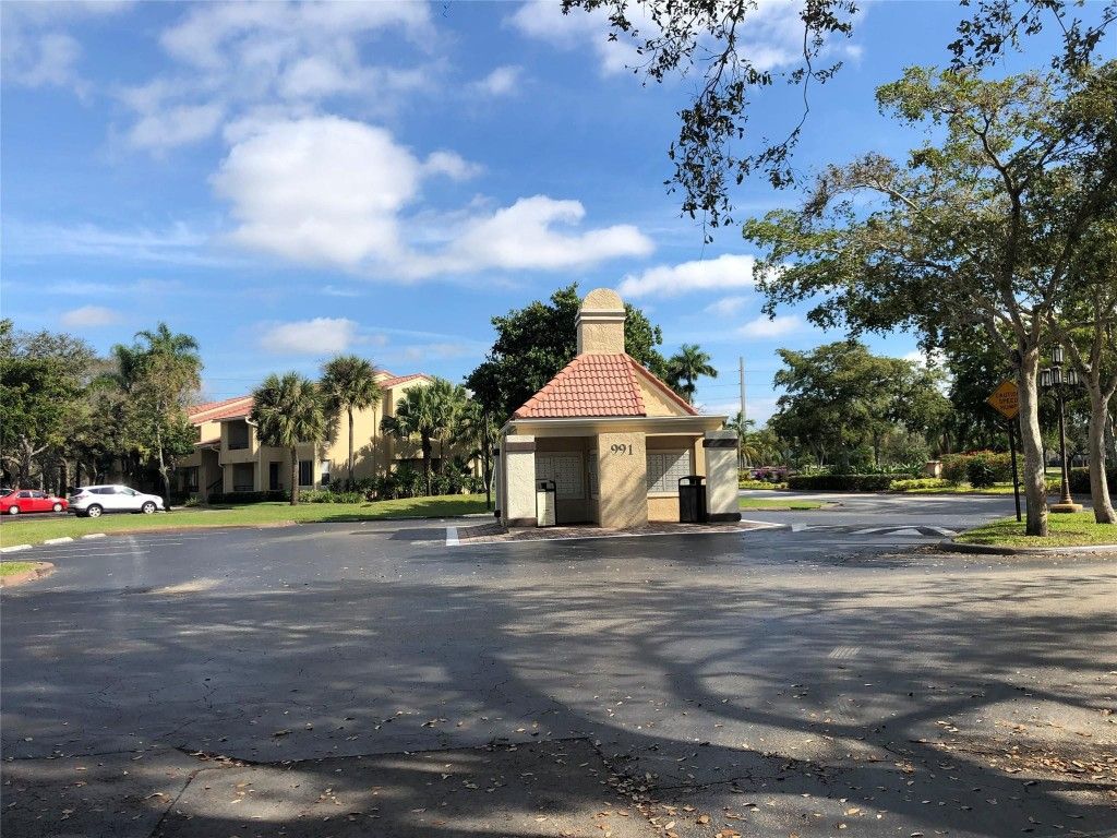 Photo of 651 Lyons Road #10104, Coconut Creek, FL 33063 (MLS # F10543915)