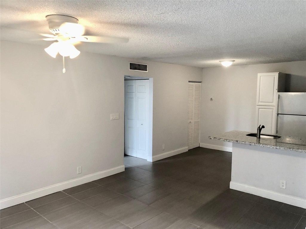 Photo of 651 Lyons Road #10104, Coconut Creek, FL 33063 (MLS # F10543915)