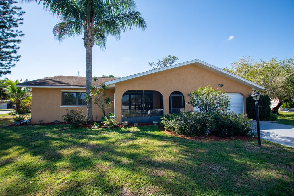 Photo of 102 SW Crescent Avenue, Port Saint Lucie, FL 34984 (MLS # R10866236)