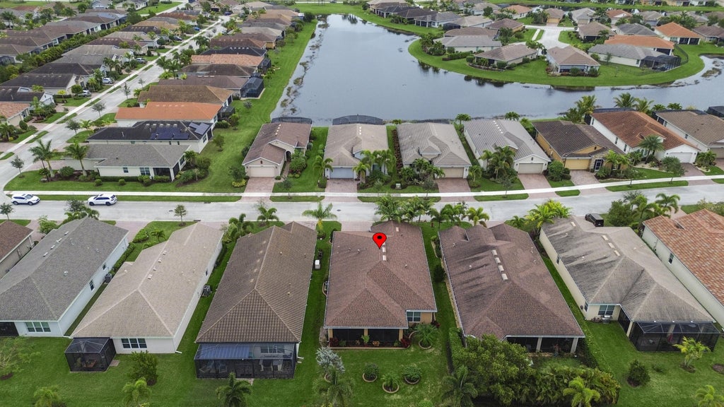 Photo of 10095 SW Indian Lilac Trail, Port Saint Lucie, FL 34987 (MLS # R10995886)