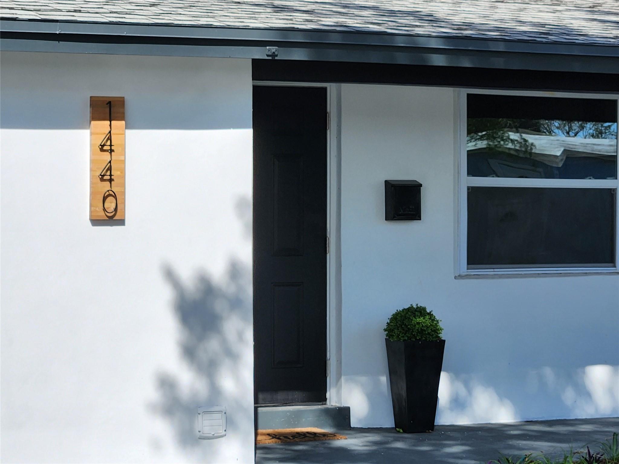 Price adjusted to make this charming coastal vibe home yours AND seller is OFFERING assistance with closing costs! this 3/2 NEWLY REMODELED home is within 2 miles of Deerfield Beach!!! NO HOA, oversized corner lot - room for a POOL, BOAT or RV or work trucks- and circular drive accommodates several cars! NEW EVERYTHING from floors, baseboards, fans, door knobs, paint to FULL bath and kitchen remodel. Exterior fresh stucco and paint. Great backyard deck for entertaining and gardening! The back bedroom has an exterior access door if you need to rent or use for Air BNB to HELP WITH YOUR MORTGAGE! IMPACT windows, tankless water heater. Owner is an agent. INVESTORS welcome.