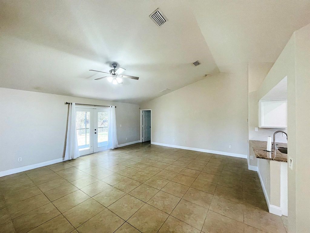 Photo of 1930 SW Glenco Street, Port Saint Lucie, FL 34953 (MLS # R11040979)