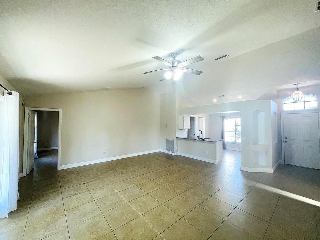 Photo of 1930 SW Glenco Street, Port Saint Lucie, FL 34953 (MLS # R11040979)