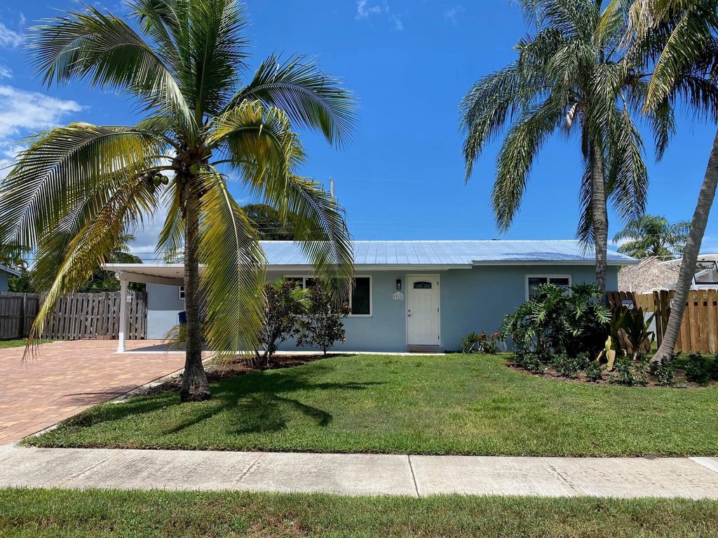Photo of 916 Eucalyptus Road, North Palm Beach, FL 33408 (MLS # R10922756)