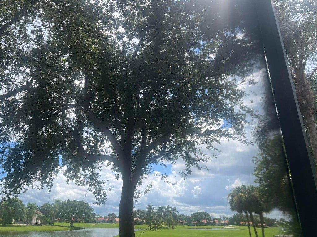 Photo of 4194 IMPERIAL ISLE Drive, Lake Worth, FL 33449 (MLS # B26072912)