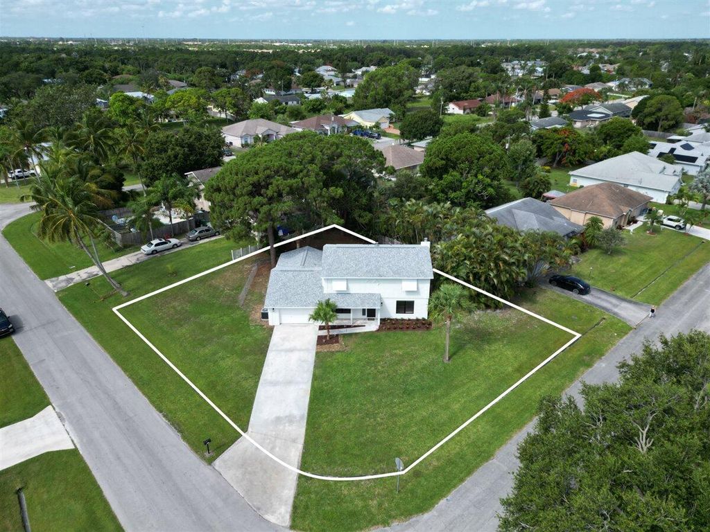 Photo of 2474 SE Calais Street, Port Saint Lucie, FL 34952 (MLS # R10993747)