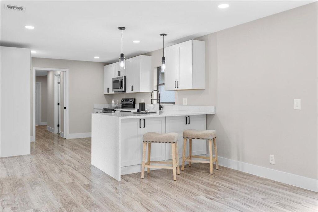 Photo of 2474 SE Calais Street, Port Saint Lucie, FL 34952 (MLS # R10993747)