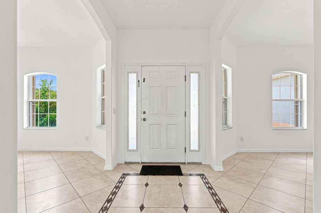 Photo of 1787 SW CAMEO Boulevard, Port Saint Lucie, FL 34953 (MLS # B26061962)