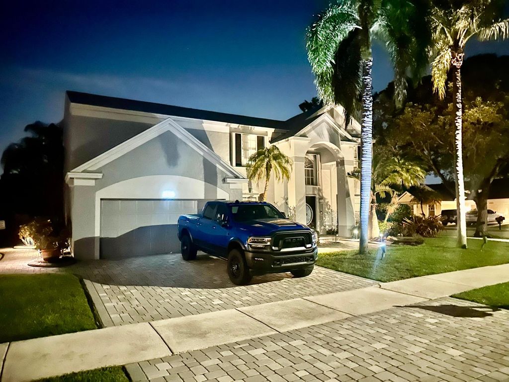 Photo of 10319 Grove Street, Cooper City, FL 33328 (MLS # B26012465)