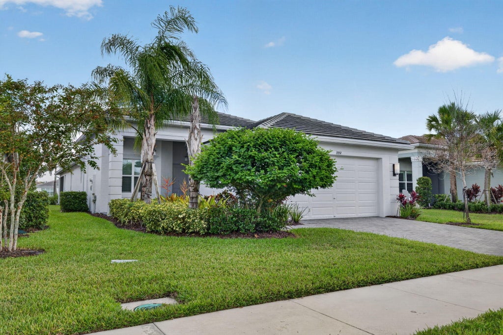 Photo of 13352 SW River Rock Road, Port Saint Lucie, FL 34987 (MLS # B26038287)