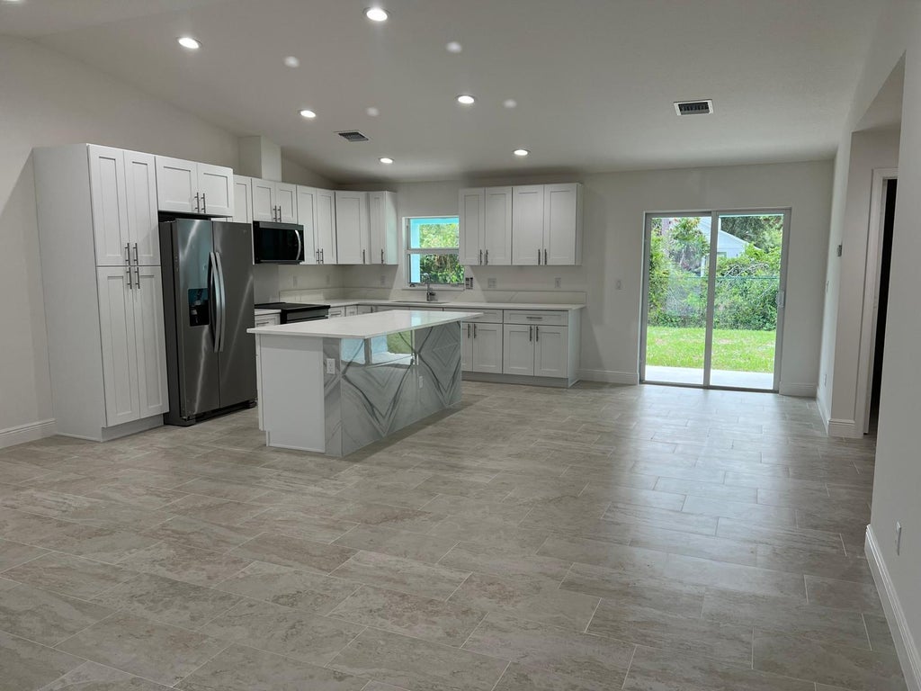 Photo of 5913 Seagrape Drive, Fort Pierce, FL 34982 (MLS # B26066283)