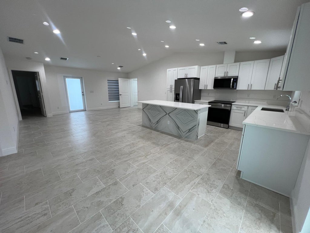 Photo of 5913 Seagrape Drive, Fort Pierce, FL 34982 (MLS # B26066283)