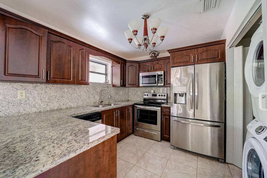 Don't Miss Out On This Beautifull HOME!!!! NO HOA! Great for investors, or First Time Home Buyers! New Roof From 2019!! Updated and remodeled 3 bedroom 2 bath! Boasting granite countertops and new cabinetry in the kitchen. Both bathrooms have been remodeled as well! Partial Impact Windows! Two additional sheds located in your fully fenced in back yard. Highly desirable location! This home is just a few minutes from Islas Canarias and Tamiami Lakes Park, the turnpike, schools, dining and shopping centers!! WILL NOT LAST. SCHEDULE YOUR SHOWING TODAY!!