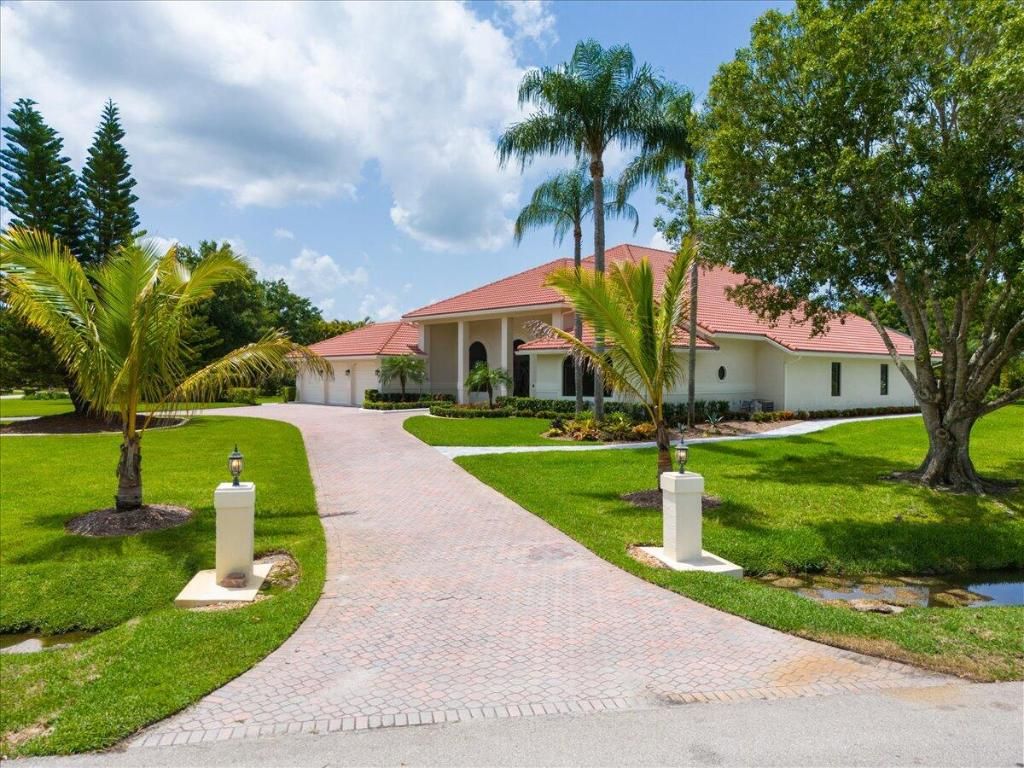 Photo of 7916 Saddlebrook Drive, Port Saint Lucie, FL 34986 (MLS # R11098693)