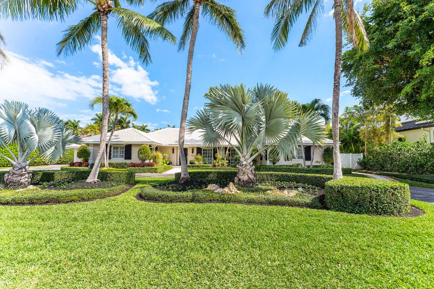 Ideally positioned just minutes from the beach and iconic Atlantic Avenue, this single-story residence delivers refined coastal living in one of Delray Beach's most sought-after locations. Thoughtfully designed for seamless indoor/outdoor living, the light-filled interiors are anchored by a glassed, solarium style family room that opens to a private, backyard featuring a sparkling pool, lush tropical landscaping, and screened patio. Offering 3 bedrooms, 3.1 baths, and 2,547 square feet, the home blends a sophisticated transitional aesthetic with an effortless, functional layout. Every detail is curated for comfort and style, creating a serene retreat just moments from world class dining, shopping, and the coastline.