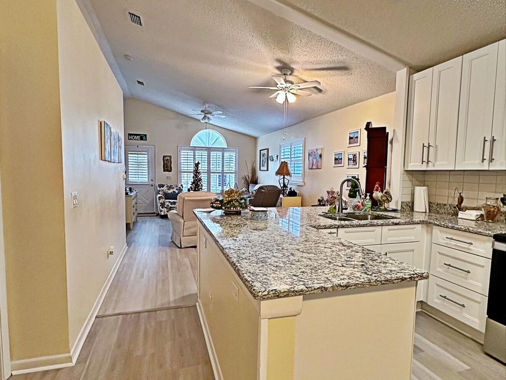 Photo of 1176 NW Lombardy Drive, Port Saint Lucie, FL 34986 (MLS # R11030999)