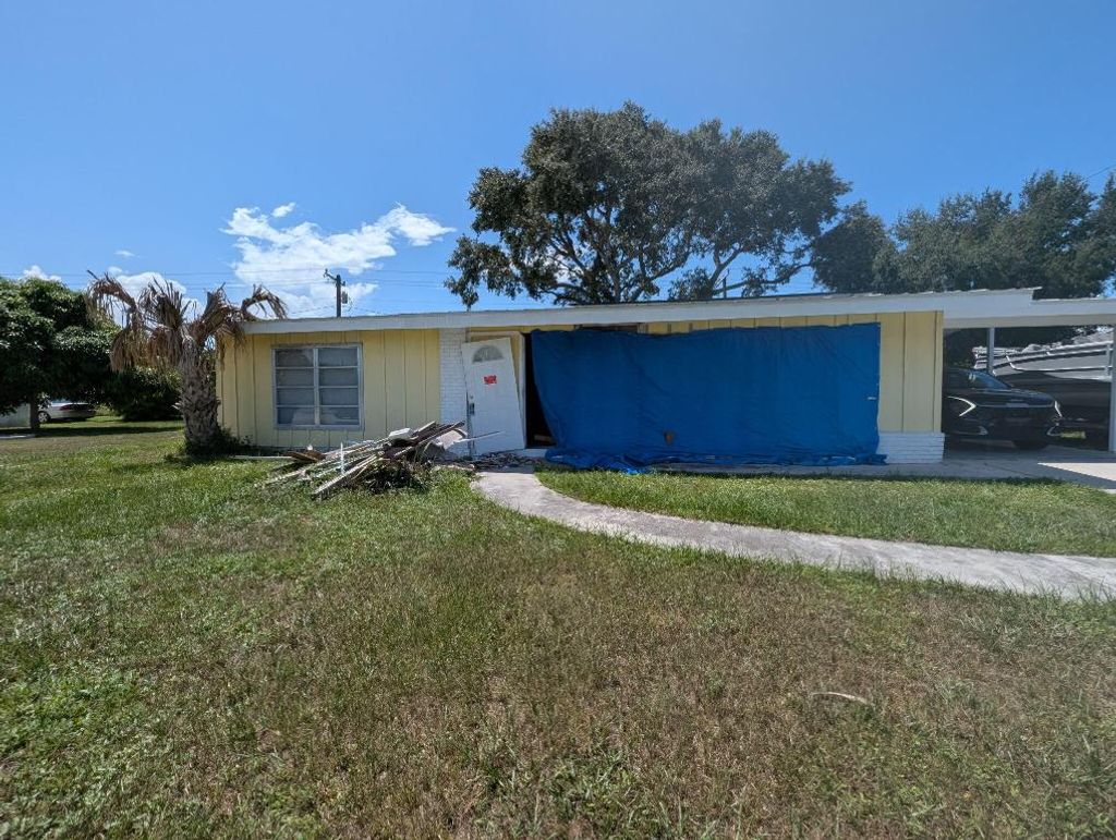Photo of 550 SW Airoso Boulevard, Port Saint Lucie, FL 34983 (MLS # R11119849)
