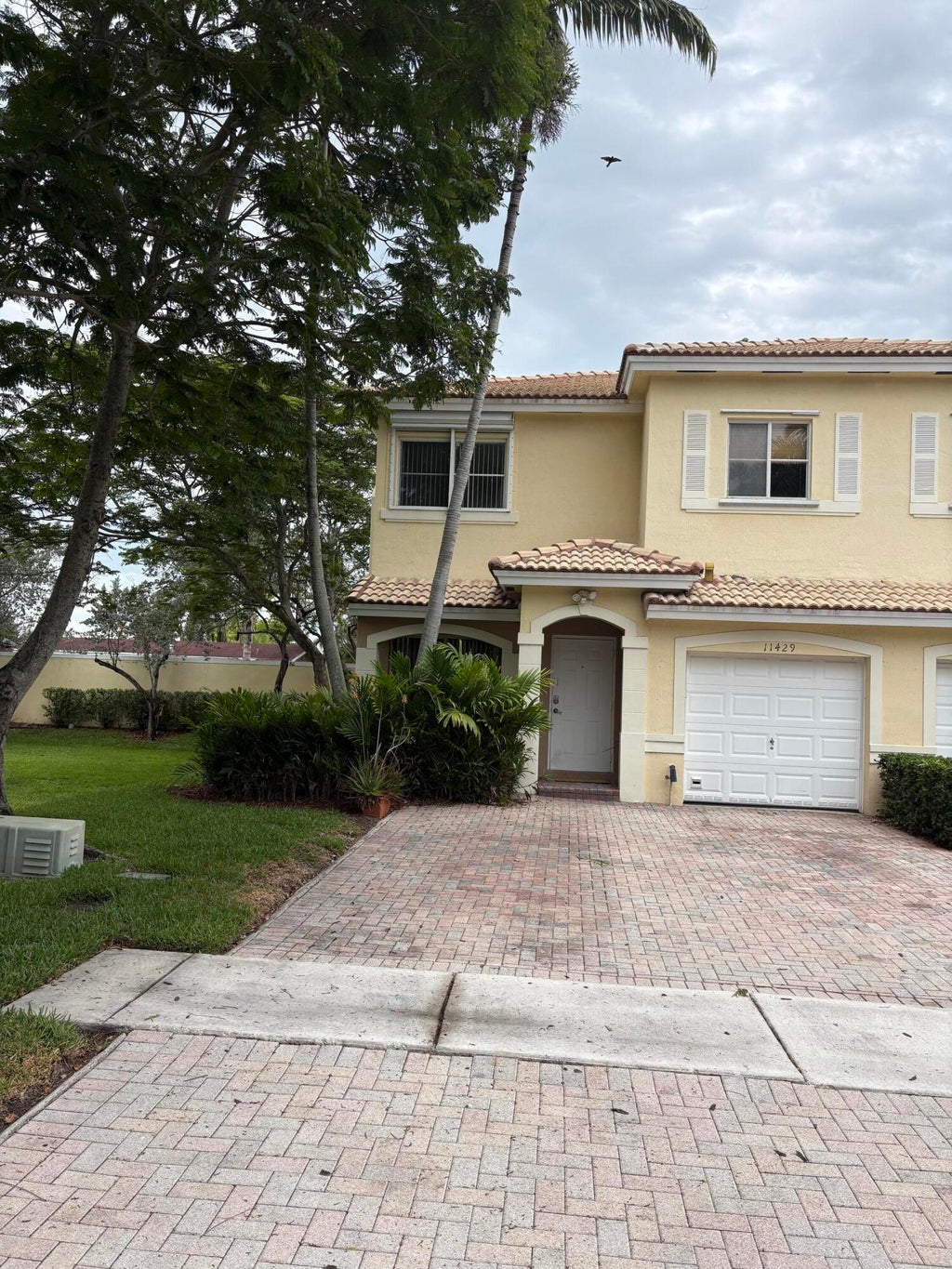 Photo of 11429 NW 34th Place, Sunrise, FL 33323 (MLS # B26021379)