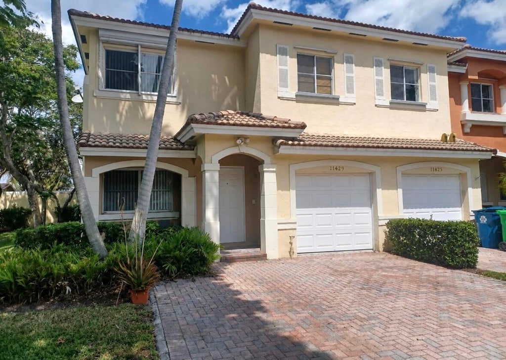 Photo of 11429 NW 34th Place, Sunrise, FL 33323 (MLS # B26021379)