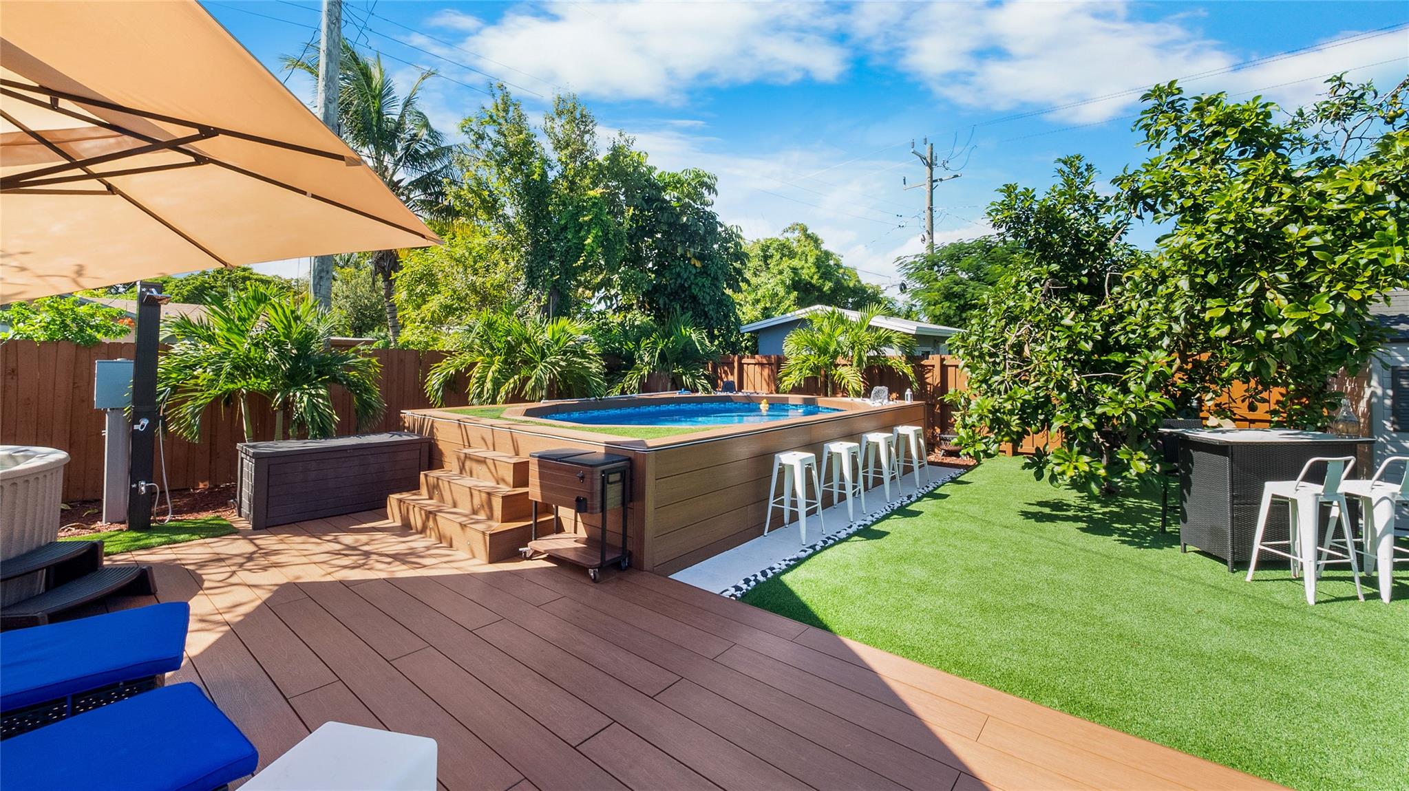 Live every day like you're on vacation in this resort-style home, From the moment you step inside, you're welcomed by a brand-new interior that blends modern elegance with everyday comfort. But the true escape begins when you step into the backyard—a private oasis designed for ultimate relaxation and entertainment. The brand-new pool shimmers in the sun, jacuzzi surrounded by tropical landscaping, custom hardscaping, and ambient lighting that transforms the space into a resort-like retreat. Enjoy lazy afternoons under the covered patio, host unforgettable evenings by the outdoor kitchen and grill, or unwind in the peaceful lounge area as the sun sets. This is more than just a home—it’s a lifestyle of luxury, convenience, and total tranquility, all in the vibrant heart of the city.