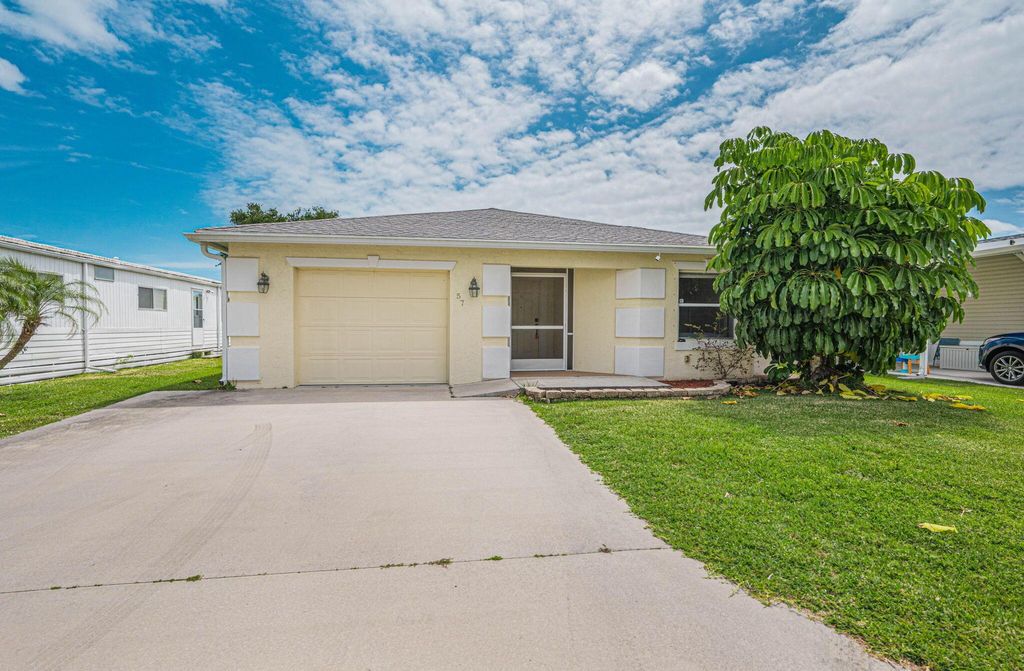 Photo of 57 Huarte Way, Port Saint Lucie, FL 34952 (MLS # R10976787)