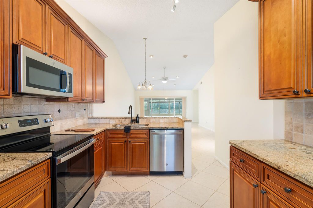 Photo of 181 Moccasin Trail N, Jupiter, FL 33458 (MLS # R10980581)
