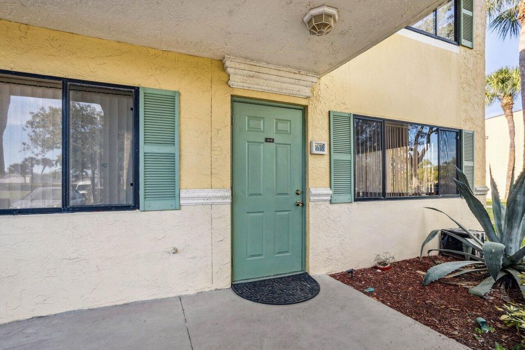 Photo of 1618 Meadows Circle W, Boynton Beach, FL 33436 (MLS # R11093941)