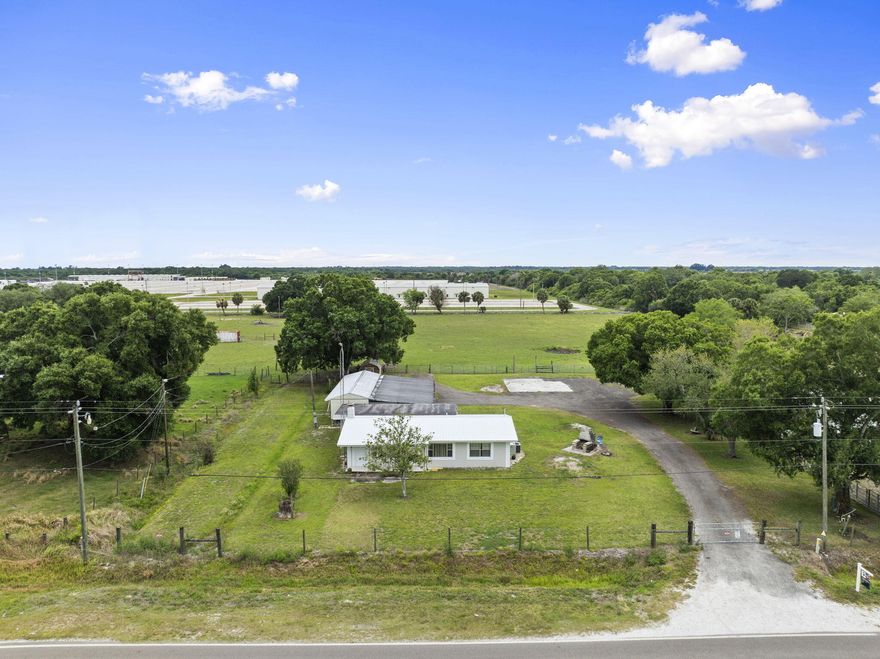 7.41-acre property with pond! Includes two separate residences, well suited for multi-generational living, guest housing, home office use, or long-term investment potential. Main residence is a 3-bedroom, 1.5 bath, CBS constructed home featuring a metal roof (2012) and a propane fireplace. The second residence is a 2-bedroom, 1 bath manufactured home built in 1986, with a metal roof (2012). Interiors have been maintained primarily as original. Additional features include a metal storage shed, asphalt millings driveway with a 60x40 parking pad. Two screened porches, two open porches, and usable acreage. Conveniently located approx. 3 miles from the center of town.