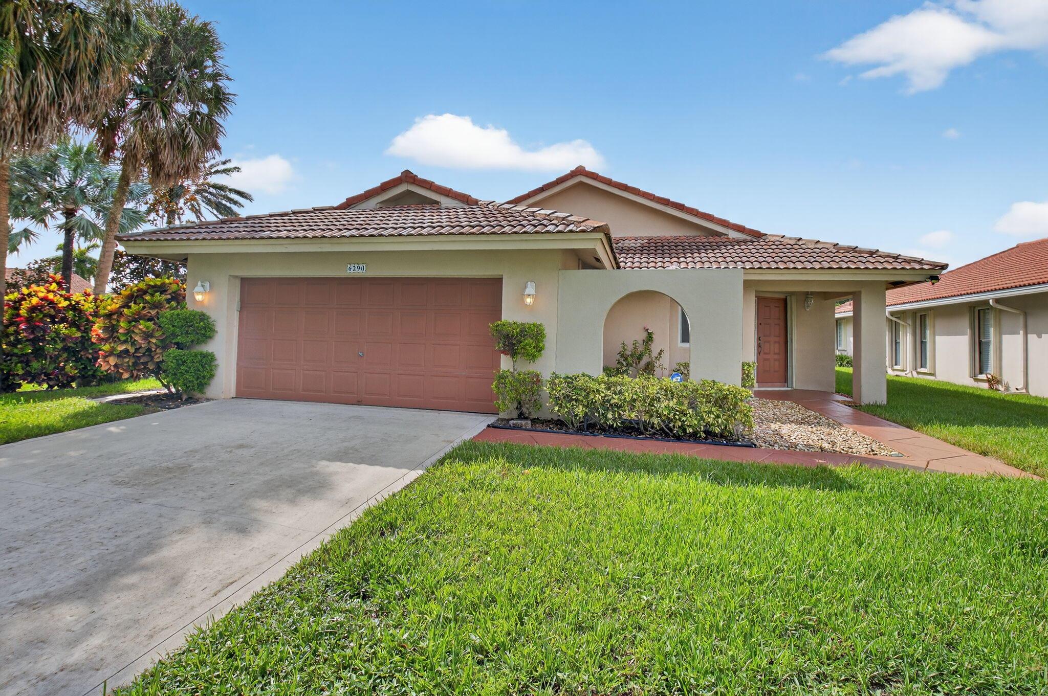 Beautifully maintained 3 BR 2 BA single-story home located on a desirable corner lot in the sought-after Vista Verde neighborhood. You'll love the spacious, light-filled living room with an open, airy layout. The eat-in kitchen features stainless steel appliances and granite countertops, seamlessly connecting to a family/TV room. The formal dining room is ideal for entertaining. The primary suite has a walk-in closet and a private ensuite bath. Additional highlights include mostly impact glass windows for peace of mind, and a brand-new A/C installed in June 2025. Prime Central Boca location--just a short walk to Town Center Mall, Publix, A-rated Verde Elementary School, and multiple houses of worship. A true gem in an unbeatable location!