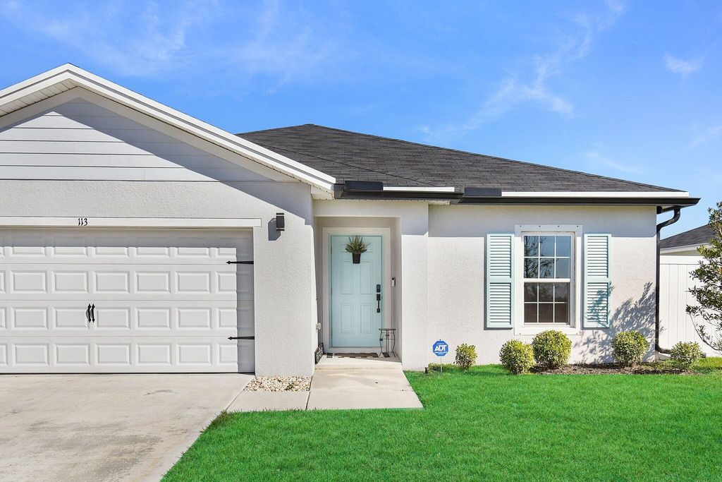 Photo of 113 Dabou Loop, Belle Glade, FL 33430 (MLS # R11162162)