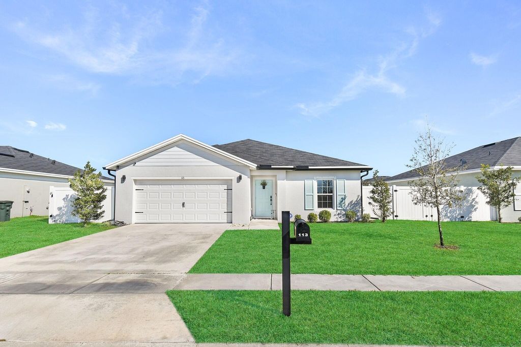 Photo of 113 Dabou Loop, Belle Glade, FL 33430 (MLS # R11162162)