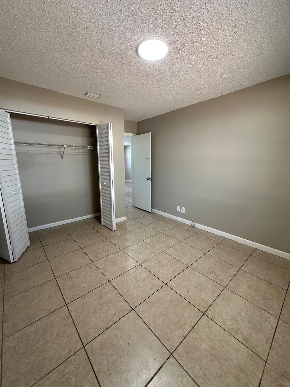 PALM BEACH FARMS CO 7 - Residential Lease