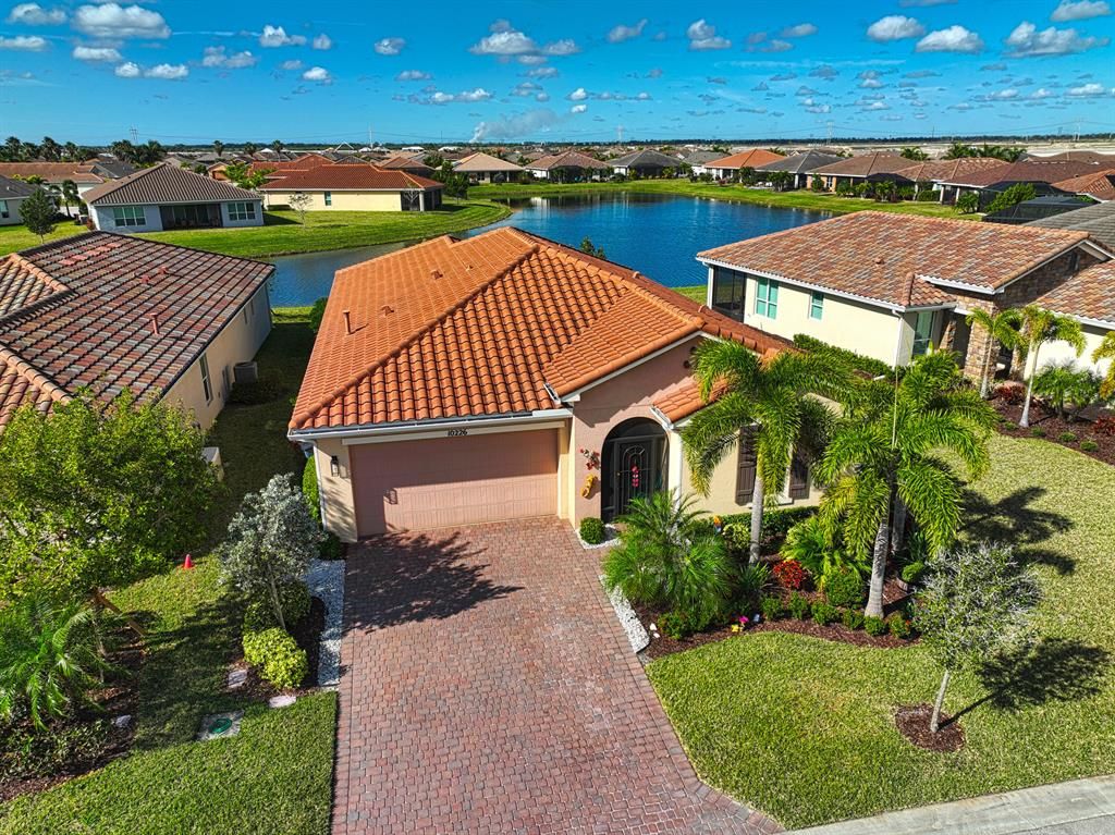 Photo of 10226 SW Coral Tree Circle, Port Saint Lucie, FL 34987 (MLS # R10859760)