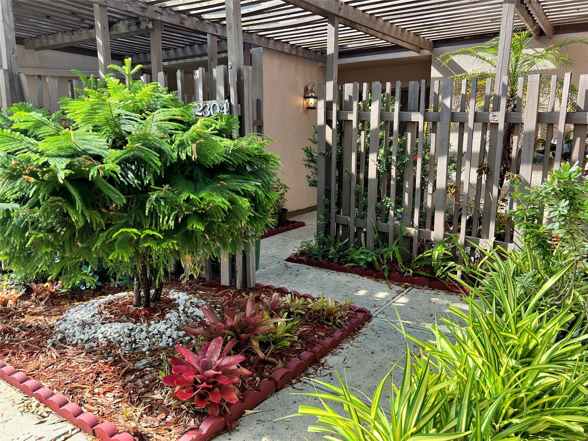 Welcome to your cozy canal-side retreat in the gated community of Flamingo Villas! Enjoy 1,396sf of comfortable living that includes a large family room, a renovated bathroom, and a kitchen fitted with newer appliances.
Unwind on your private screened patio, overlooking tranquil canal views—a perfect spot for relaxation. This quaint, low-maintenance home lets you enjoy the surrounding community amenities, such as a pool, spa, steam room, tennis, indoor racquetball, & pickleball courts. Conveniently located near Pembroke Lakes Mall, Memorial Hospital West, CB Smith Park, and I-75, this home provides easy access to shopping, healthcare, recreation, and commuting options. Situated in the welcoming Flamingo Villas community, it's perfect for those seeking a serene lifestyle!