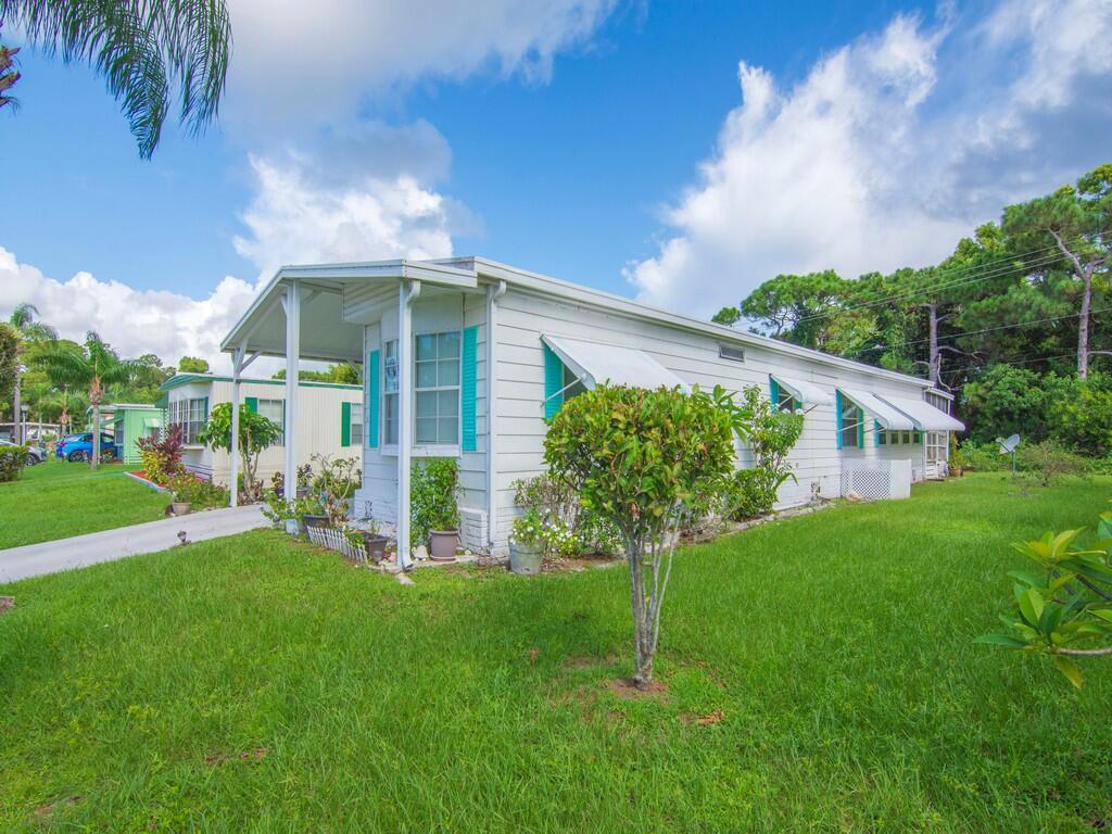 Lovely two-bedroom, two-bathroom split floor plan home in an active 55+ community. Home is located in the pet section with a private backyard. The lot rent includes fantastic amenities such as a 9-hole golf course, pool, clubhouse, tennis courts, and more! Enjoy meeting new friends and taking part in the many monthly social events hosted by the residents.