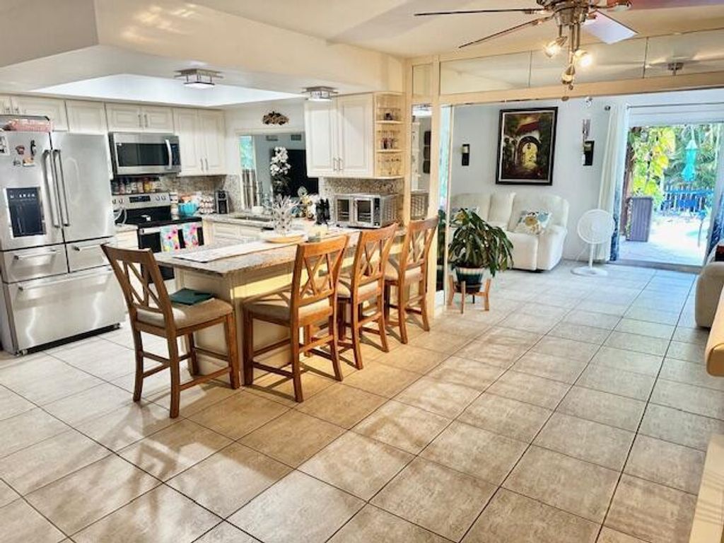 Photo of 68 W Coconut Drive, Lake Worth, FL 33467 (MLS # R11103359)