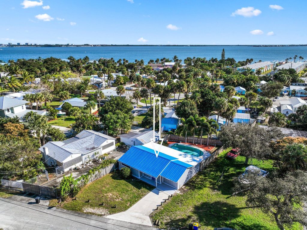 Photo of 2495 NE Hickory Avenue, Jensen Beach, FL 34957 (MLS # R10957986)