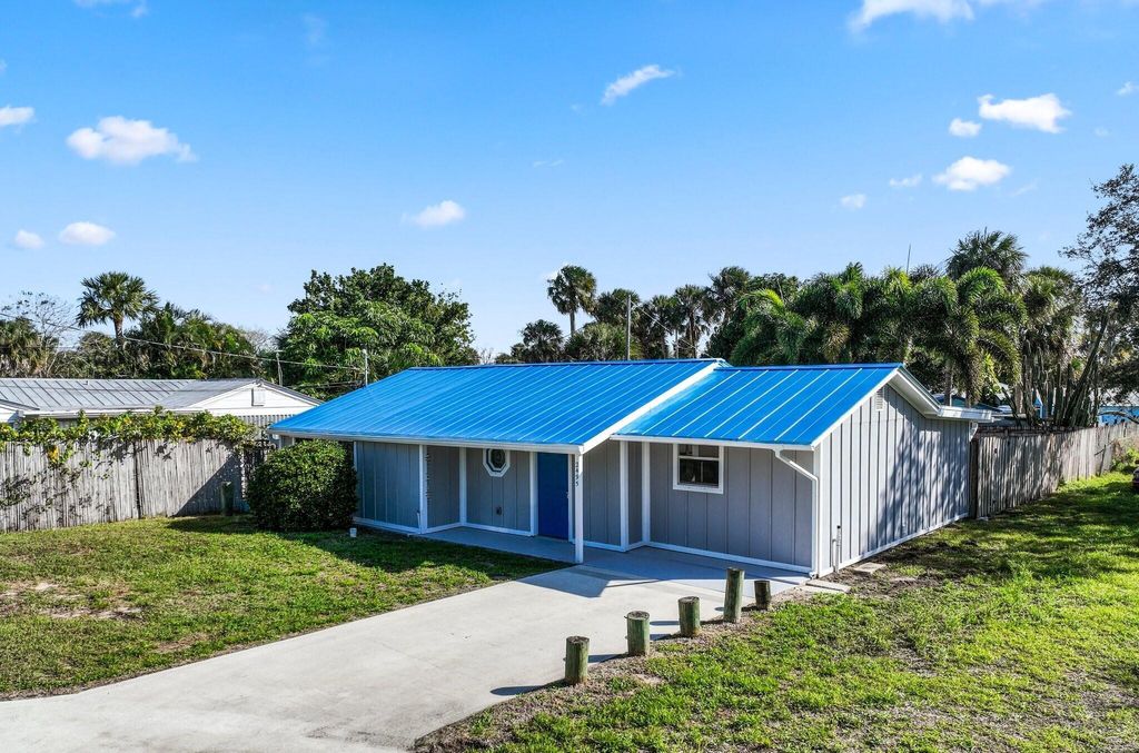 Photo of 2495 NE Hickory Avenue, Jensen Beach, FL 34957 (MLS # R10957986)