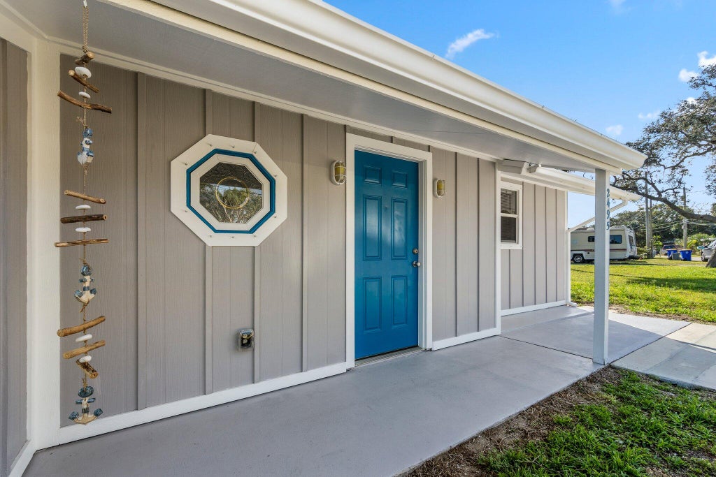 Photo of 2495 NE Hickory Avenue, Jensen Beach, FL 34957 (MLS # R10957986)