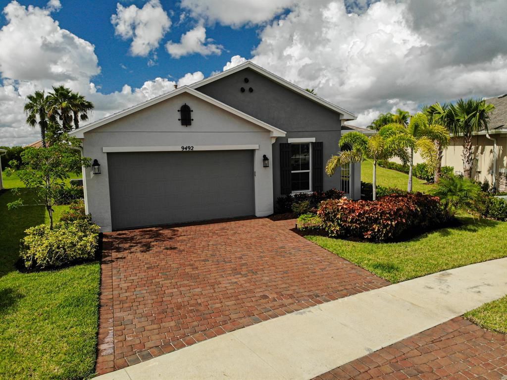 Photo of 9492 SW Royal Poinciana Drive, Port Saint Lucie, FL 34987 (MLS # R10738067)