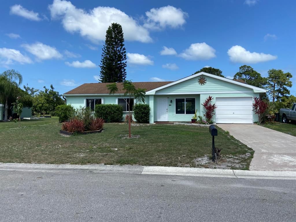 Photo of 1741 SE Burgundy Lane, Port Saint Lucie, FL 34953 (MLS # R10712492)