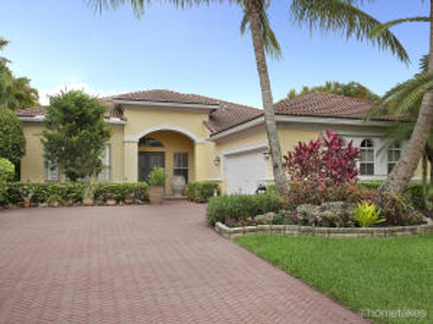 Beautiful home, 2 Master Suites, Screened in Patio, Views of Lake and Golf Course, Full Accordion Shutters, Full generator in-ground 500 gal. tank, wind guard windows, custom landscaped, exercise room and much more. 24 hr security, manned gate, country club community. Membership not mandatory.