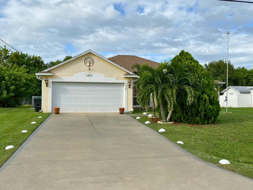 Photo of 1361 SW Gastador Avenue, Port Saint Lucie, FL 34953 (MLS # R11077940)