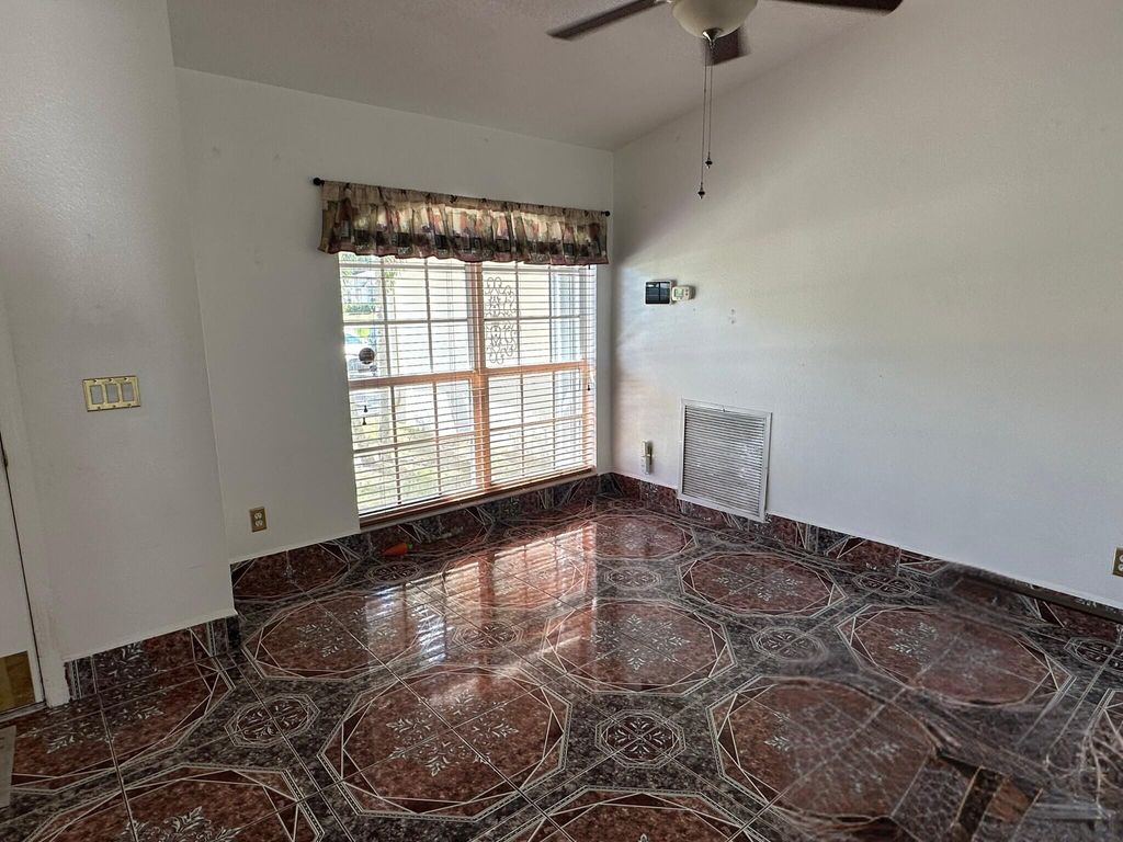 Photo of 1361 SW Gastador Avenue, Port Saint Lucie, FL 34953 (MLS # R11077940)