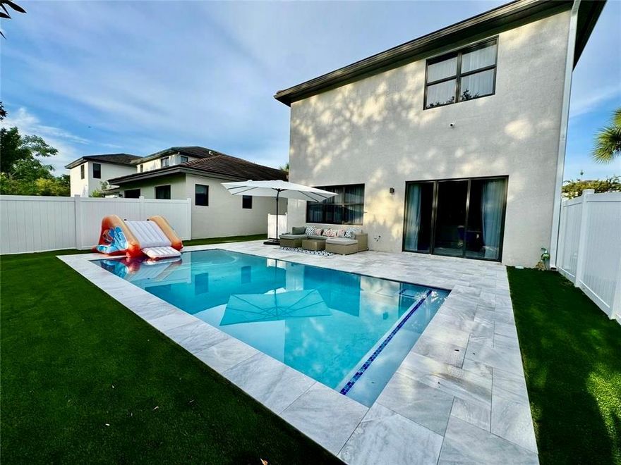 Experience South Florida living at its finest in this beautifully renovated 4-bed 4-bath pool home located in a prestigious gated community on Whispering Way. This spacious residence combines modern design, comfort, and complete privacy. Featuring an open-concept layout with high ceilings, the home is filled with natural light The gourmet kitchen is equipped with stainless steel appliances, quartz countertops, large center island. Step outside to your private fenced backyard oasis, complete with a sparkling swimming pool, spacious patio, and lush landscapin — ideal for relaxing, and enjoying Florida’s year-round sunshine. Washer & dryer. Large driveway with multiple parking spaces. Perfectly situated minutes from Publix, Dania Pointe, Fort Lauderdale Airport, I-95, beaches, parks, schools