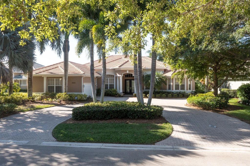 Photo of 1682 SW Foxpoint Trail, Palm City, FL 34990 (MLS # R10794933)