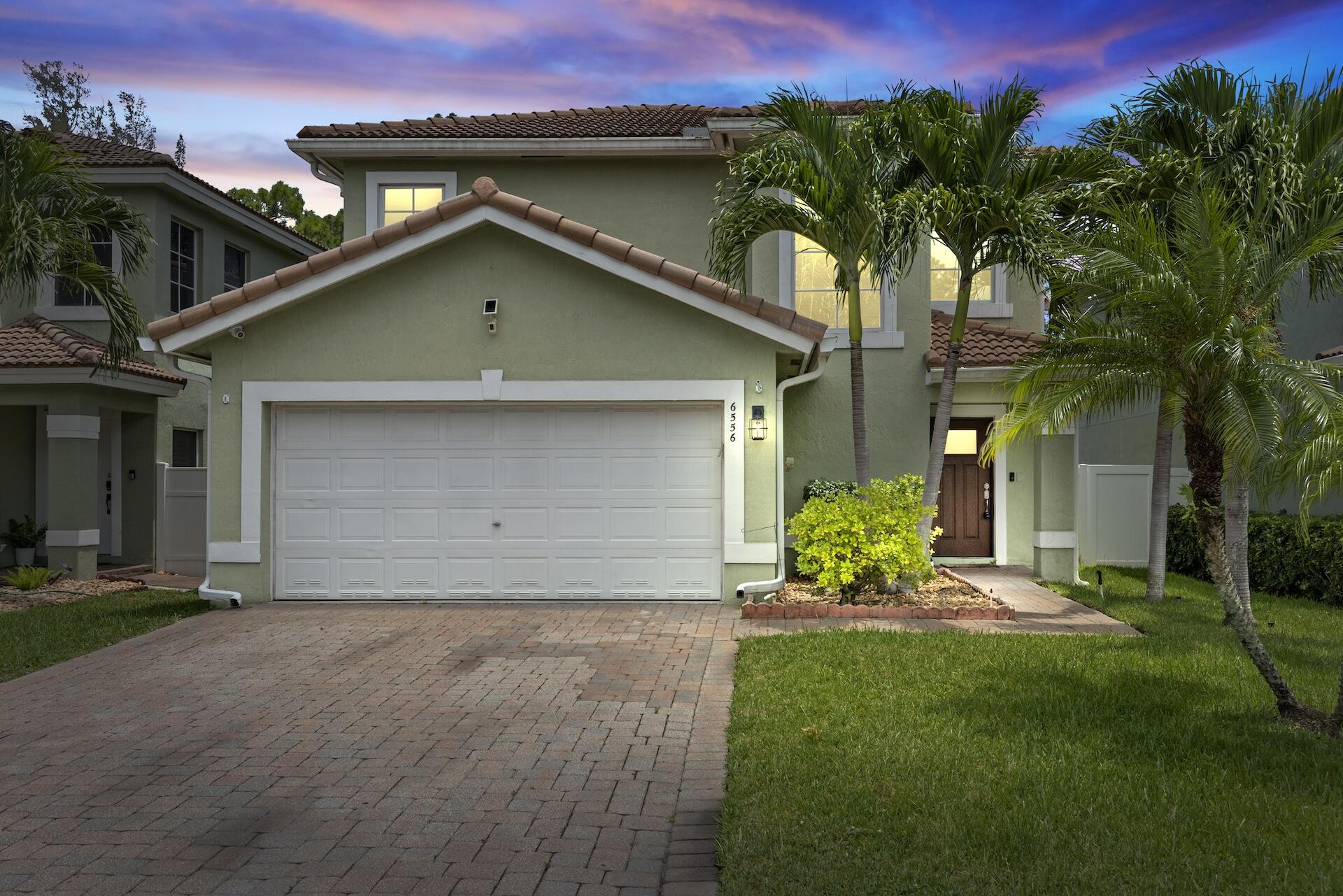 Step into style and comfort with this 3-bedroom, 2.5-bath, 2-story single-family home in a desirable unmanned gated community! Featuring a newly remodeled kitchen and bathrooms, crown molding throughout the living areas, and hurricane impact windows & doors (2020) for peace of mind. The bonus entertainment room, covered back patio, and fully fenced yard are perfect for relaxing or hosting guests. Upstairs, you'll find all bedrooms plus a convenient laundry area and a Jack & Jill bath. The 2-car garage, home monitoring hookup, and regularly serviced A/C add to the comfort. Enjoy community perks including a sparkling pool and tennis court--with HOA maintaining all common areas. Recent updates include a hot water heater (2023), giving you one less thing to worry about. Just bring your vision